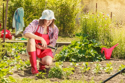 Neasden gardeners in training with safe tool handling